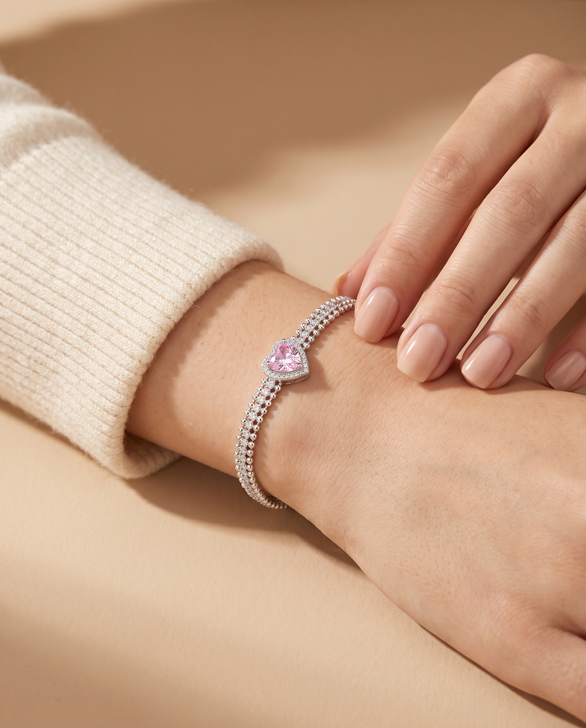 Pink Heart Triple Chain Bracelet worn on the wrist