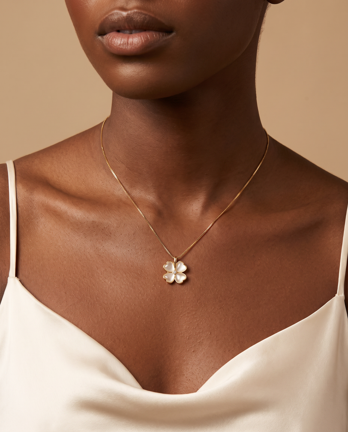 Model wearing the gold-tone Heart Clover Pendant Necklace